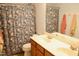 Bathroom with double sink vanity and shower with floral curtain at 642 Collington Dr, Mebane, NC 27302