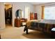 Spacious bedroom with carpet, closet, dresser, and a comfortable bed with blanket at 642 Collington Dr, Mebane, NC 27302