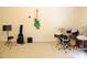Bedroom with a drum set, electric guitar, music stand, and natural light at 642 Collington Dr, Mebane, NC 27302