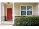 Exterior view of front door and window at 642 Collington Dr, Mebane, NC 27302
