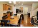 Spacious kitchen and dining area featuring an island and ample cabinet space at 642 Collington Dr, Mebane, NC 27302