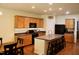 Spacious kitchen with a central island, ample counter space, and stainless steel appliances at 642 Collington Dr, Mebane, NC 27302