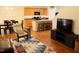 Open-concept kitchen and dining area with island seating and modern appliances, ideal for entertaining at 642 Collington Dr, Mebane, NC 27302