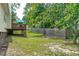 The backyard view showcases the home's wooden deck at 700 Mossburn Ct, Fuquay Varina, NC 27526