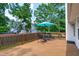 Outdoor wooden deck with table and chairs; a place for relaxation or entertainment at 700 Mossburn Ct, Fuquay Varina, NC 27526