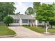 Well-maintained home with a lovely front yard and concrete driveway at 700 Mossburn Ct, Fuquay Varina, NC 27526