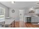 Bright kitchen with breakfast nook, stainless steel appliances, and ample counter space at 700 Mossburn Ct, Fuquay Varina, NC 27526