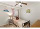 Charming bedroom featuring a single bed with patterned bedding and unique decor accents at 7002 Longstreet Dr # C, Raleigh, NC 27615