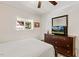 Inviting bedroom with neutral paint, ceiling fan, and carpet flooring at 7002 Longstreet Dr # C, Raleigh, NC 27615