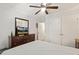 Inviting bedroom with neutral paint, ceiling fan, and carpet flooring at 7002 Longstreet Dr # C, Raleigh, NC 27615