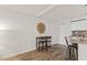 Eat-in kitchen with seating for two, and modern light fixture at 7002 Longstreet Dr # C, Raleigh, NC 27615