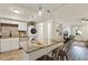 Modern kitchen featuring stylish island seating, ample counter space, and convenient appliances at 7002 Longstreet Dr # C, Raleigh, NC 27615