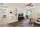 Comfortable living room with built-in shelves, modern TV, and cozy seating area at 7002 Longstreet Dr # C, Raleigh, NC 27615