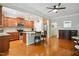 Open kitchen featuring stainless steel appliances, granite countertops, and a center island with bar seating at 733 Bluffcreek Dr, Fuquay Varina, NC 27526