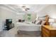 Spacious main bedroom featuring tray ceilings, neutral tones, and plush carpeting at 733 Bluffcreek Dr, Fuquay Varina, NC 27526