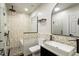 Renovated bathroom with vessel sink, frameless shower, and modern finishes at 7414 Brandon Allen Ave, Raleigh, NC 27613