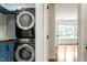 Clean, well-organized laundry area with a modern washer and dryer at 7414 Brandon Allen Ave, Raleigh, NC 27613