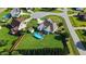 Overhead view of backyard featuring an above-ground pool and well manicured lawn at 8101 Claybrooke Ct, Willow Springs, NC 27592