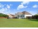 Wide view of the backyard with well maintained lawn, shed, wooden fence and above ground pool at 8101 Claybrooke Ct, Willow Springs, NC 27592