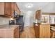 Functional kitchen featuring granite countertops, stainless steel appliances, and hardwood floors at 8101 Claybrooke Ct, Willow Springs, NC 27592