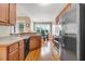 Bright kitchen boasts stainless steel appliances, granite countertops, and an eat-in breakfast area at 8101 Claybrooke Ct, Willow Springs, NC 27592