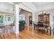 An open floor plan showing the great room and dining areas, hardwood flooring, and neutral color palette at 8101 Claybrooke Ct, Willow Springs, NC 27592