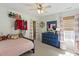 ' bedroom featuring a bed and a pink and white striped hamper at 8205 Rolling Glenn Dr, Raleigh, NC 27616
