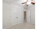 Large closet with ample storage space, shelving, and blue accent wall at 8205 Rolling Glenn Dr, Raleigh, NC 27616
