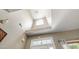 Bright, two-story foyer with skylight and entry door view at 8205 Rolling Glenn Dr, Raleigh, NC 27616