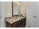 Bathroom featuring a granite countertop, undermount sink, and neutral paint color at 860 Cokesbury Rd, Fuquay Varina, NC 27526