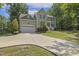 Charming two-story home with a spacious driveway, perfect for accommodating multiple vehicles at 860 Cokesbury Rd, Fuquay Varina, NC 27526