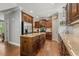 Kitchen with granite counters, stainless steel appliances, and island at 860 Cokesbury Rd, Fuquay Varina, NC 27526