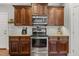 Kitchen featuring stainless steel oven and microwave and granite countertops at 860 Cokesbury Rd, Fuquay Varina, NC 27526