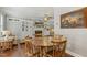 View of the living room from the dining area, showcasing the fireplace at 860 Cokesbury Rd, Fuquay Varina, NC 27526