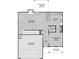 First-floor plan featuring an open-concept layout with a great room, kitchen, and two-car garage at 10 Malbec Way, Youngsville, NC 27596