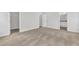 Spacious bedroom with walk-in closet, plush carpet, and a view into an ensuite bathroom at 1012 Rhino Bnd, Oxford, NC 27565
