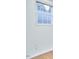 A bedroom with wood floor and a large window with backyard view at 102 Duxbury Dr, Cary, NC 27513