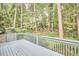 A deck with a view of wooded backyard at 102 Duxbury Dr, Cary, NC 27513