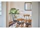 Bright dining room with a glass-top table, modern chairs, and natural light at 102 Duxbury Dr, Cary, NC 27513