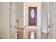 A home entryway featuring a decorative glass front door at 102 Duxbury Dr, Cary, NC 27513