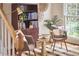 Intimate sitting area with hardwood floors, built-in bookcase, and natural light at 102 Duxbury Dr, Cary, NC 27513
