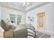 Bright bedroom features a tray ceiling, a comfortable bed, and access to a spa-like ensuite bathroom at 102 Duxbury Dr, Cary, NC 27513