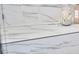 A marble tiled shower featuring modern fixtures at 102 Duxbury Dr, Cary, NC 27513