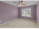 Bedroom featuring carpet, ceiling fan, and ample natural light at 1144 Dexter Ridge Dr, Holly Springs, NC 27540