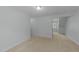 Simple bedroom with carpeted floors, a walk-in closet, and natural light, ideal for relaxation at 1144 Dexter Ridge Dr, Holly Springs, NC 27540