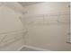 Spacious walk-in closet with metal shelving provides ample storage at 1144 Dexter Ridge Dr, Holly Springs, NC 27540