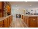 Well-lit kitchen features wooden cabinets, island, and an open layout perfect for modern living at 125 Green Ln, Clayton, NC 27520