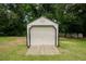 Backyard shed with white panel door on wooden ramp at 125 Green Ln, Clayton, NC 27520