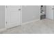 Room view showcasing doors with white trim and neutral carpeting at 128 Chapel Run Way, Chapel Hill, NC 27517