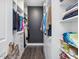 Organized walk-in closet with custom shelving, providing ample storage for clothes and accessories at 128 Chapel Run Way, Chapel Hill, NC 27517
